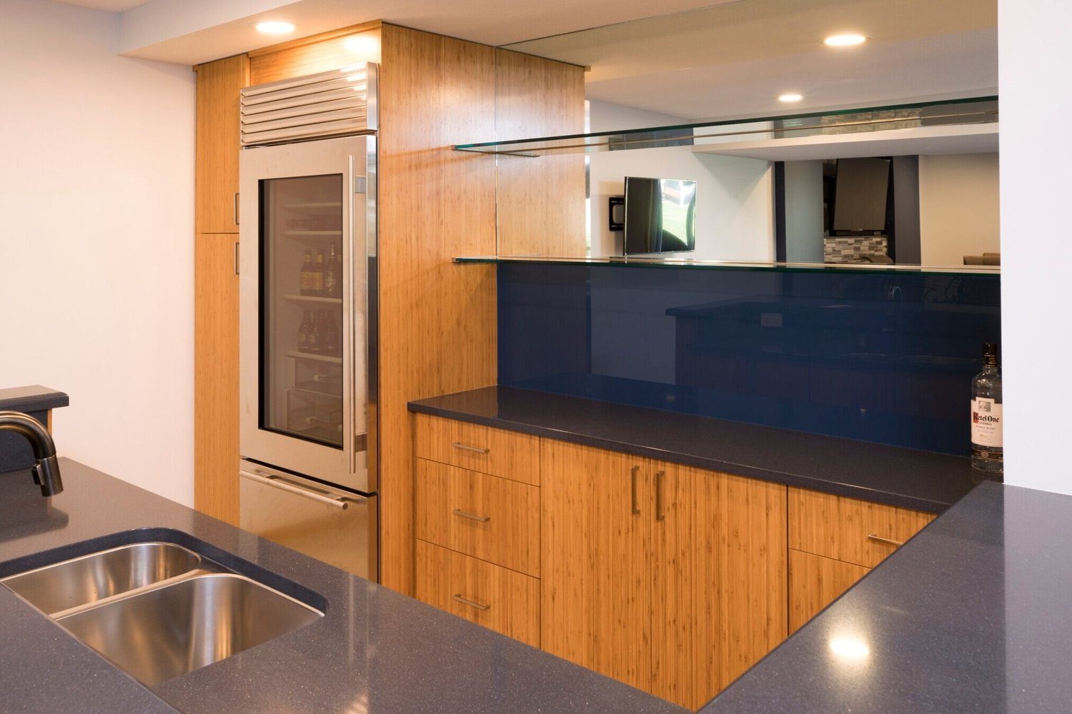 Back-painted glass bar backsplash
