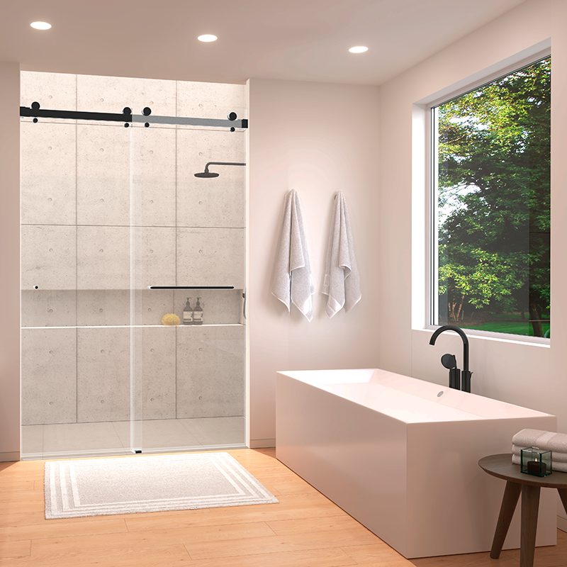 Frameless barn door shower enclosure in a bright bathroom